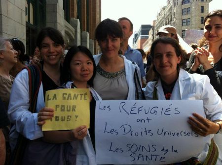 Members of Physicians for Human Rights at the Montreal protest against health care cuts for refugees. Via Speak Up for Refugees: https://www.facebook.com/SpeakUpForRefugees