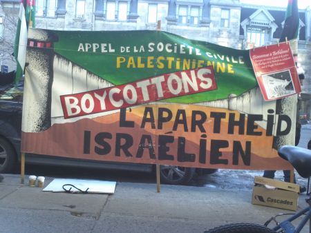 Banner at a weekly demonstration held by Palestinians and Jews United (PAJU) against Israeli apartheid