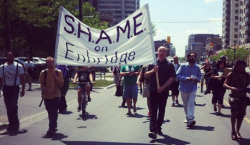 ''Protest in London, Ontario against the reversal of the Line 9 pipeline, which would allow for the transportation of tar sands oil out to East Coast ports'', picture from http://www.dominionpaper.ca/images/4481