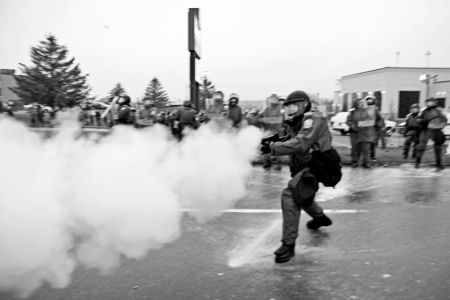 Sûreté du Québec launch tear gas toward demonstrators in Victoriaville. Photo by Nicolas Quiazua
