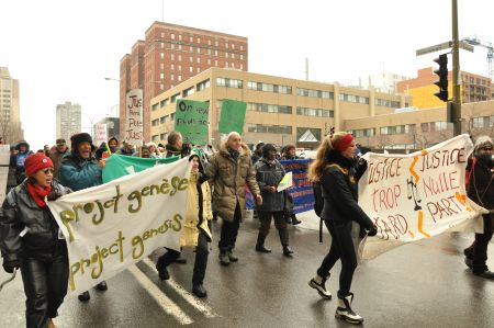 In chilly late February, Montrealers took part in a "slow march" to denounce the increase in wait times for complaints filed with Quebec's rental board. PHOTO: Project Genesis.