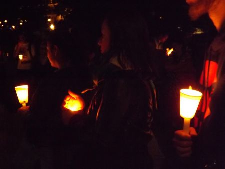 Protesters holding candles in the memory of the Palestinian victims  - July 25 Night Vigil