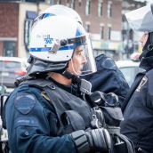 Police from Blainville were observing Montreal Riot Police during Montreal's 18th annual Protest against Police Brutality.