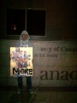  Aحmad H. عggour @Psypherize with #IdleNoMore poster in front of the Canadian Embassy in Cairo, Egypt