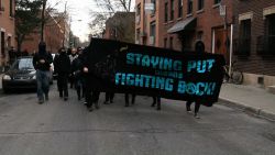 Black Bloc marches through side streets in the centre-sud