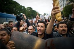 A demonstration is held against the country's new government in Tunis on January 18, 2011.