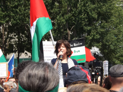 Nora Taji addressing the crowd during the August 10th Palestine-Solidarity protest